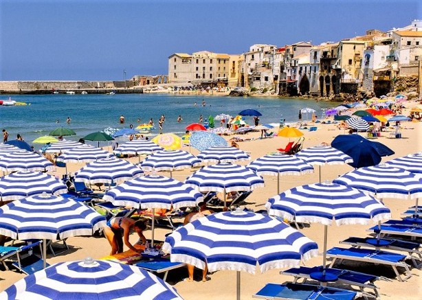 Beds and Parasols on the Beach Beds and Parasols on the Beach