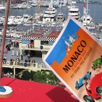 Hand Holding a Monaco Historic Book